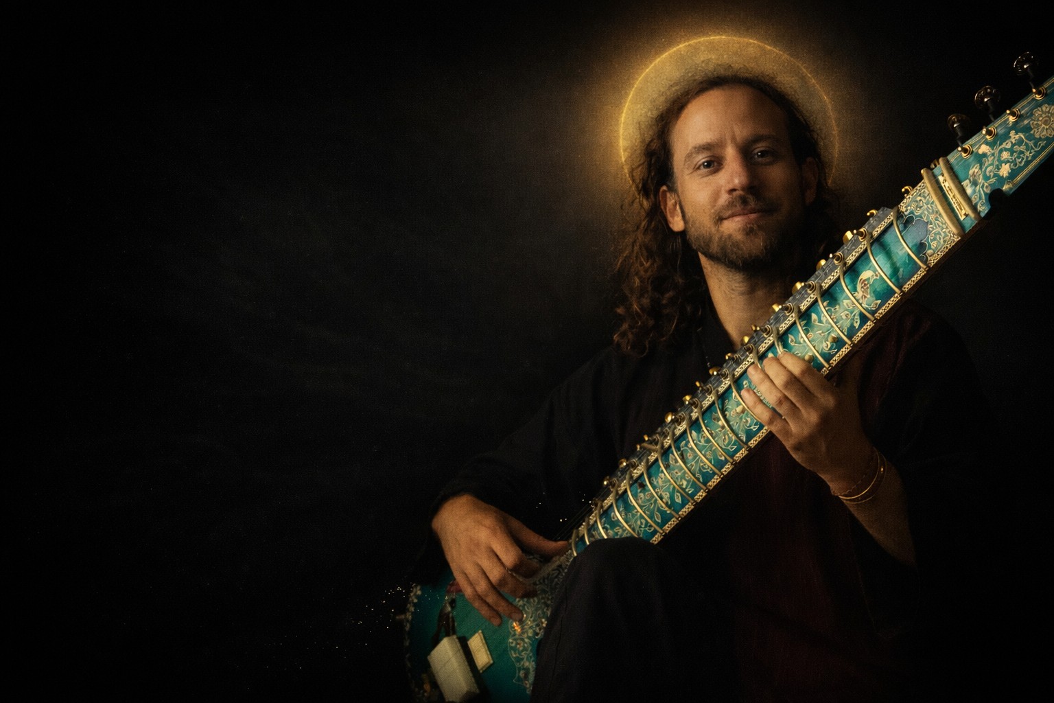 יויו סיטאר בדיוקן המשמש לתמונת הבית.